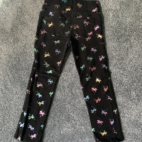 Girls black pants with colorful sparkly unicorn pattern. Size 6. Brand H&M. - Picture 4 of 6